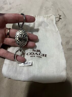 Coach Silver-Tone Embossed Toggle Key Charm
